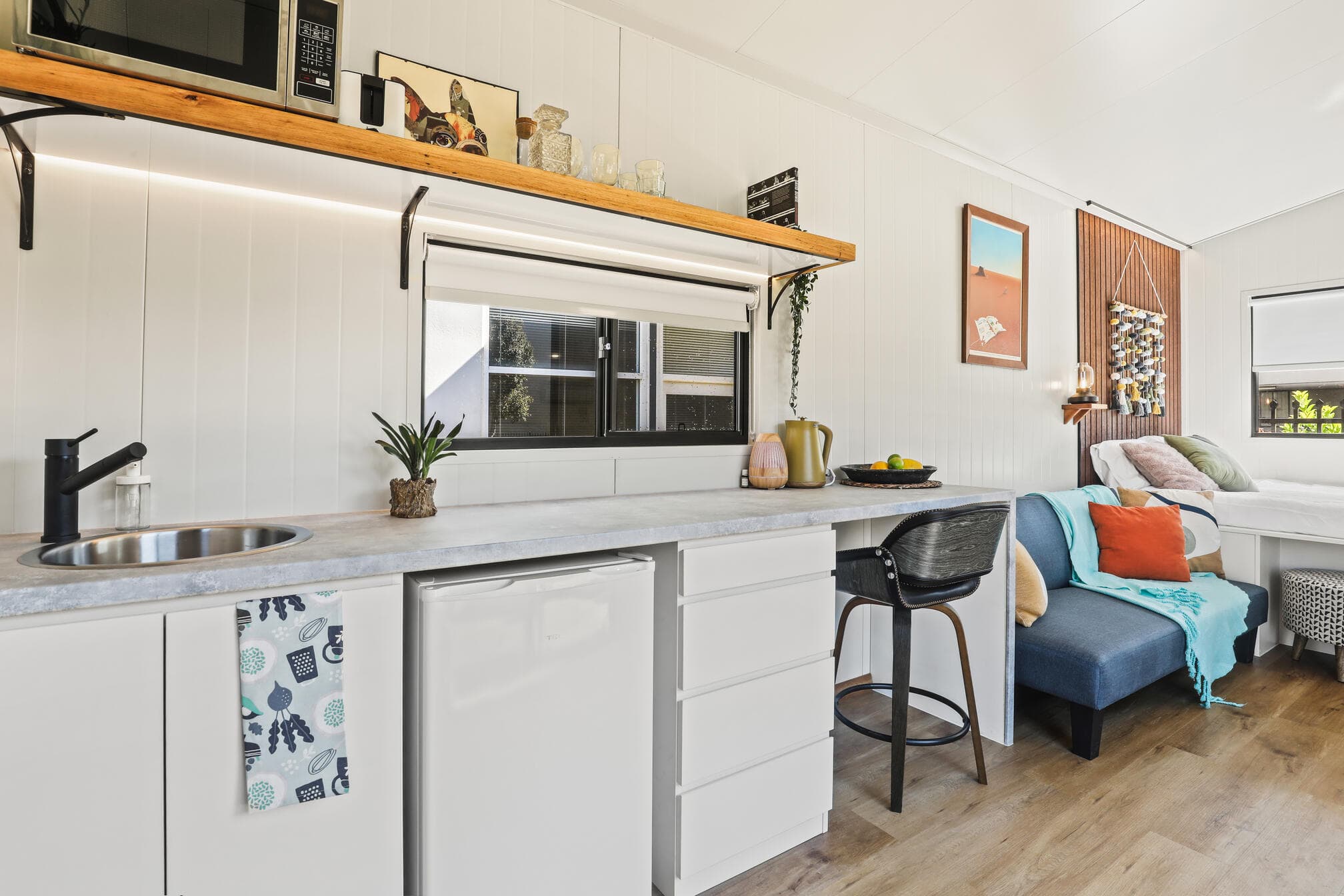 Kitchen, lounge and dining in a finished home